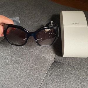 Prada shades, never worn. Case included